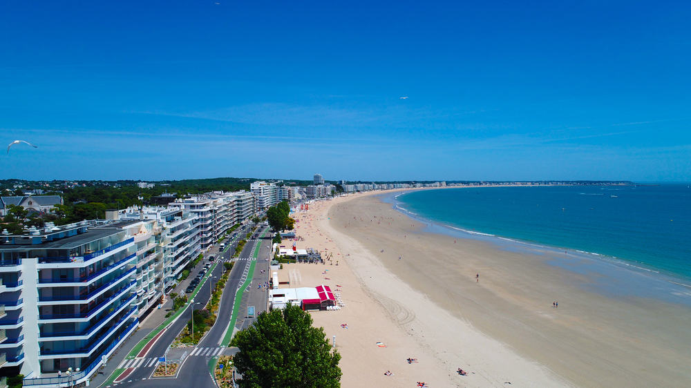 Aerial view of the beach, sea, and hotels in La Baule, France.