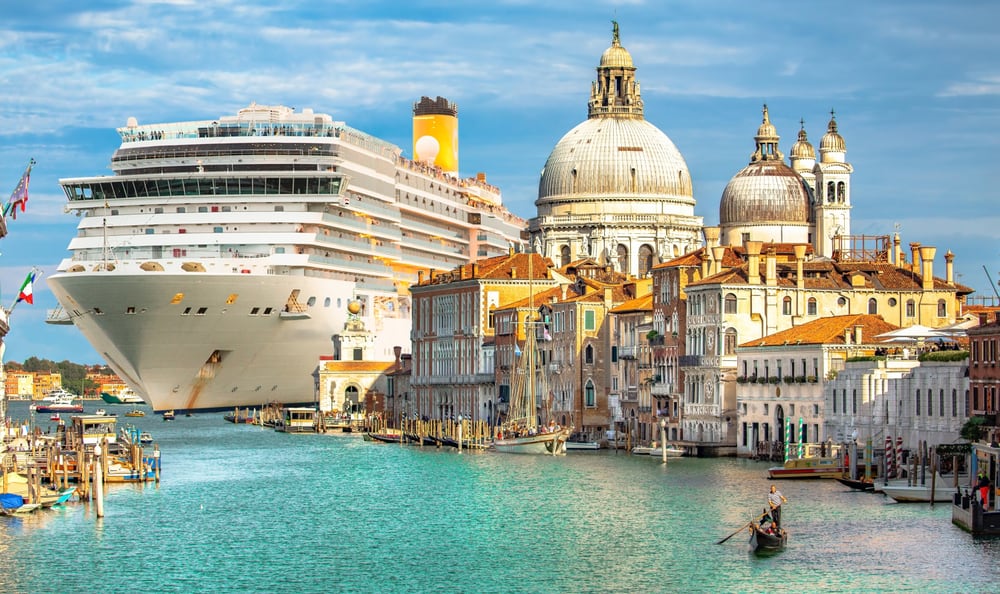 A giant cruise ship leaving Venice, Italy.