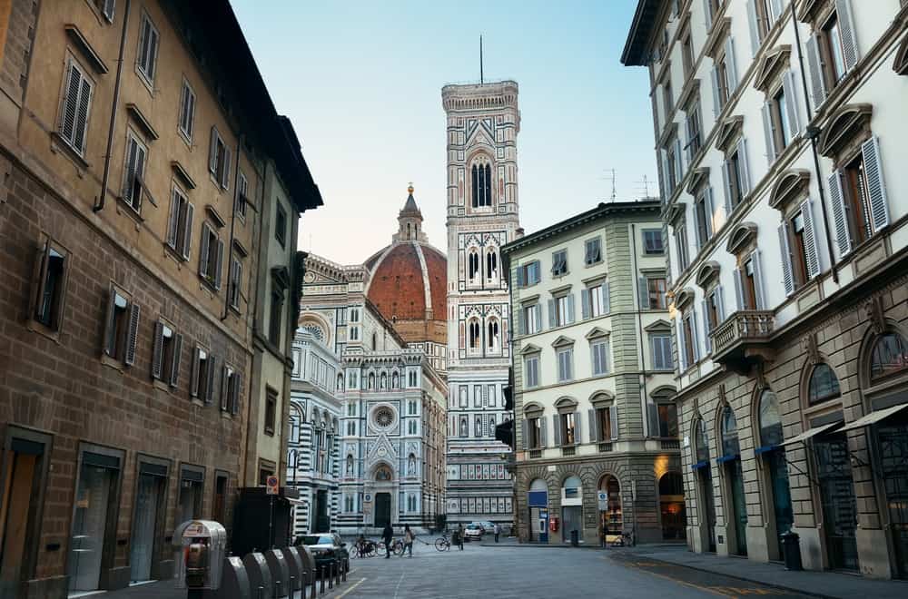 Square in Florence with the majestic Duomo Santa Maria Del Fiore in the background.