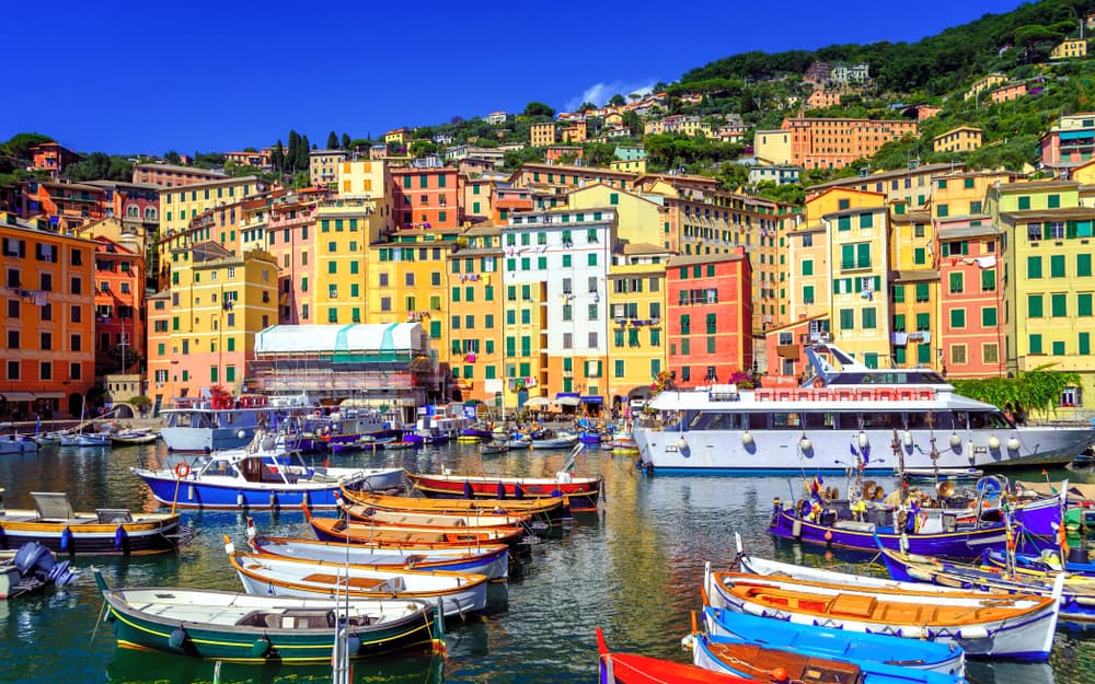 Boats in the port in the old part of Genoa, Italy.