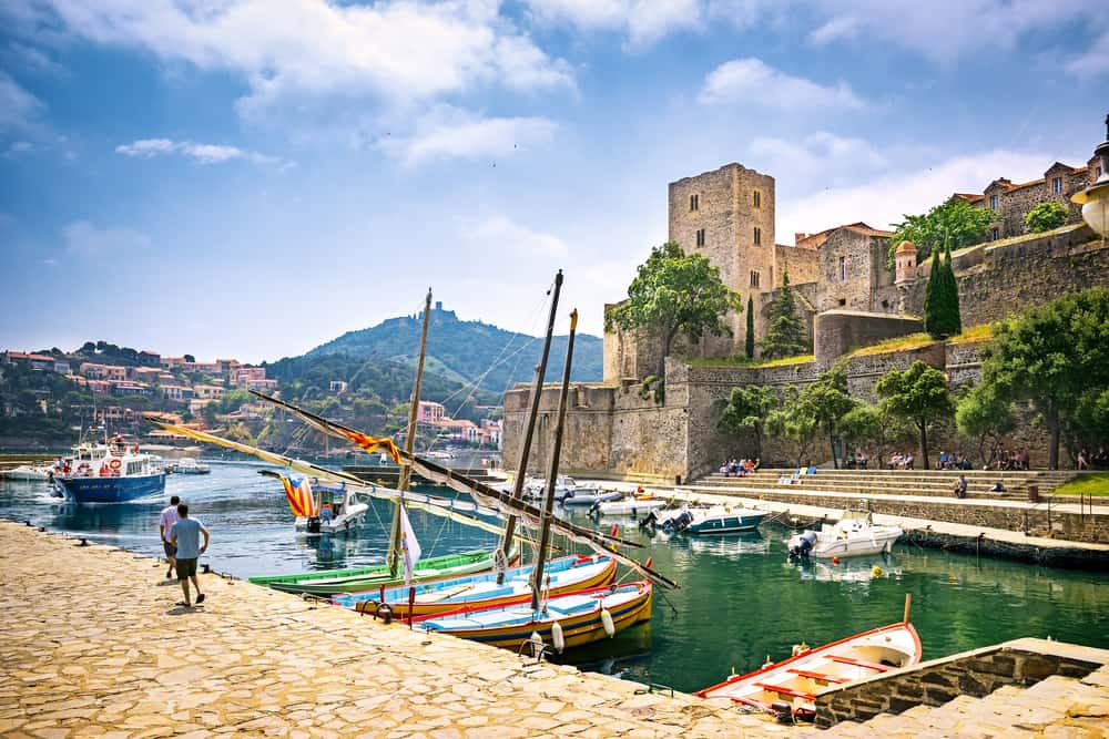 The harbour in Collioure in France with the castle in the background.