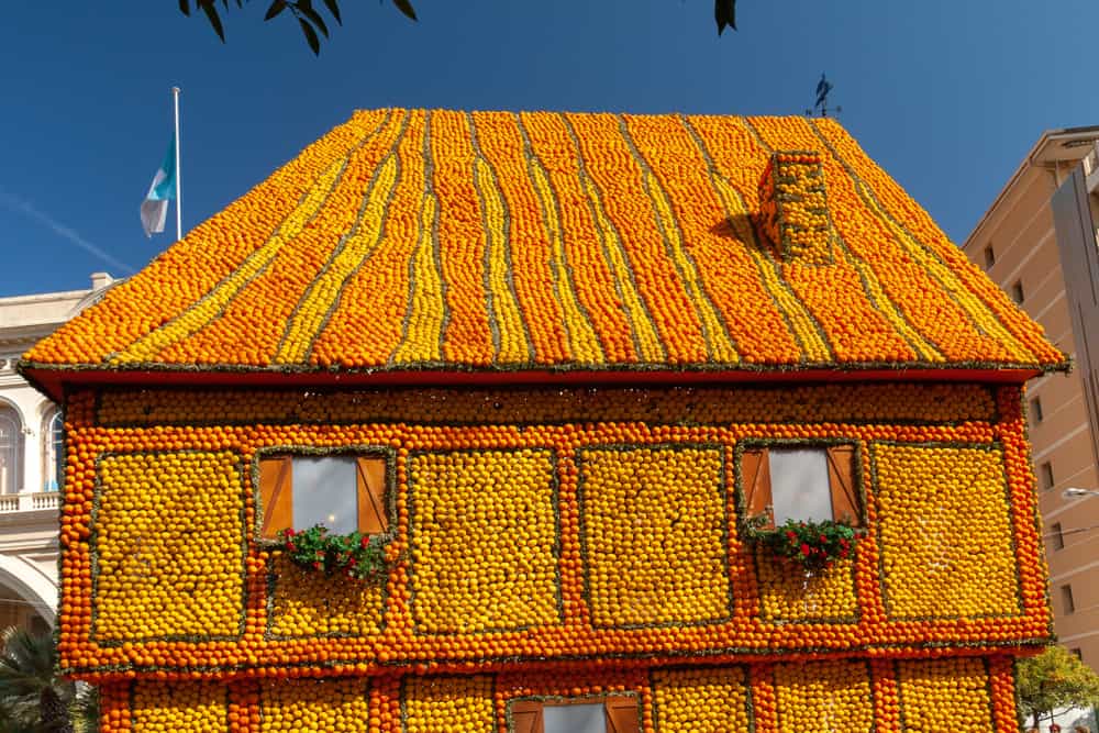 A house fully decorated with lemons and oranges during the Lemon Festival.