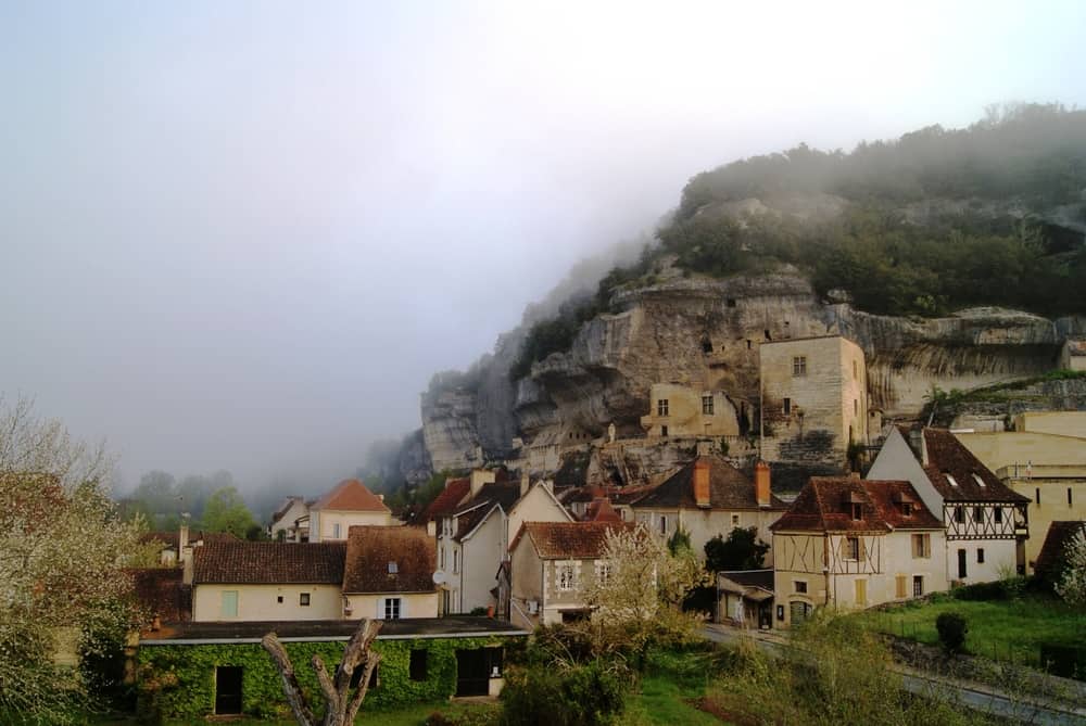 Les Eyzies de Tayac in France covered in the morning myst.