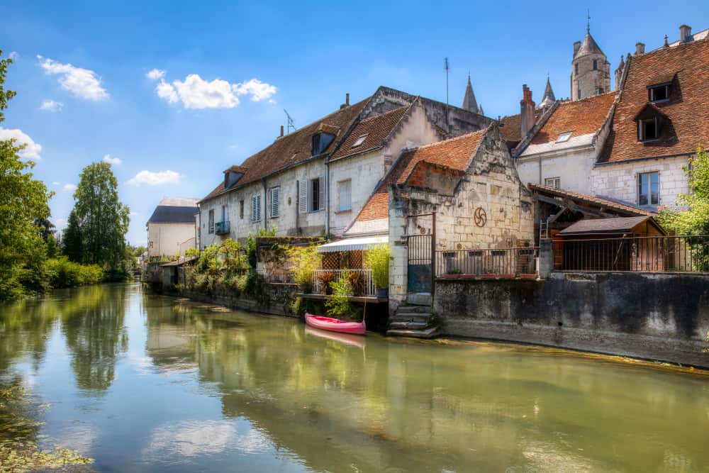 Buildings in the town of Loches in Loire Valley and the river running through.
