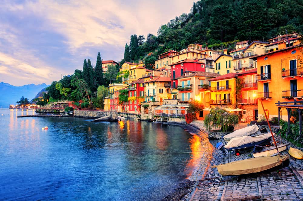 Menaggio's old town by Lake Como in Italy. Evening with lights on most buildings.