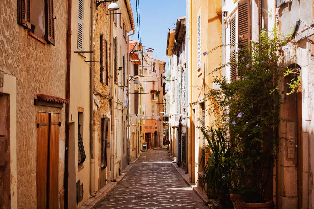Narrow street in the old part of Antibes, France.