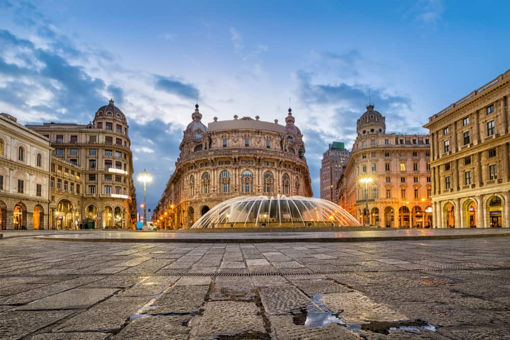 The Piazza De Ferrari square in Genoa, Italy. Fountain and old but impressive buildings.