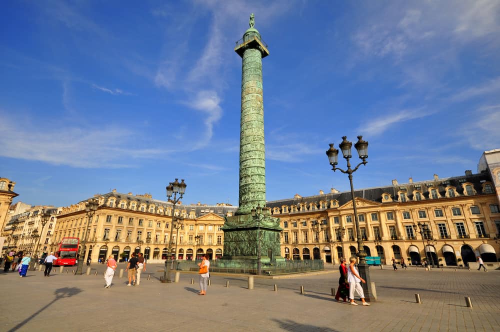 Place Vendome in Paris with the column and it's statue of Napoleon on top.