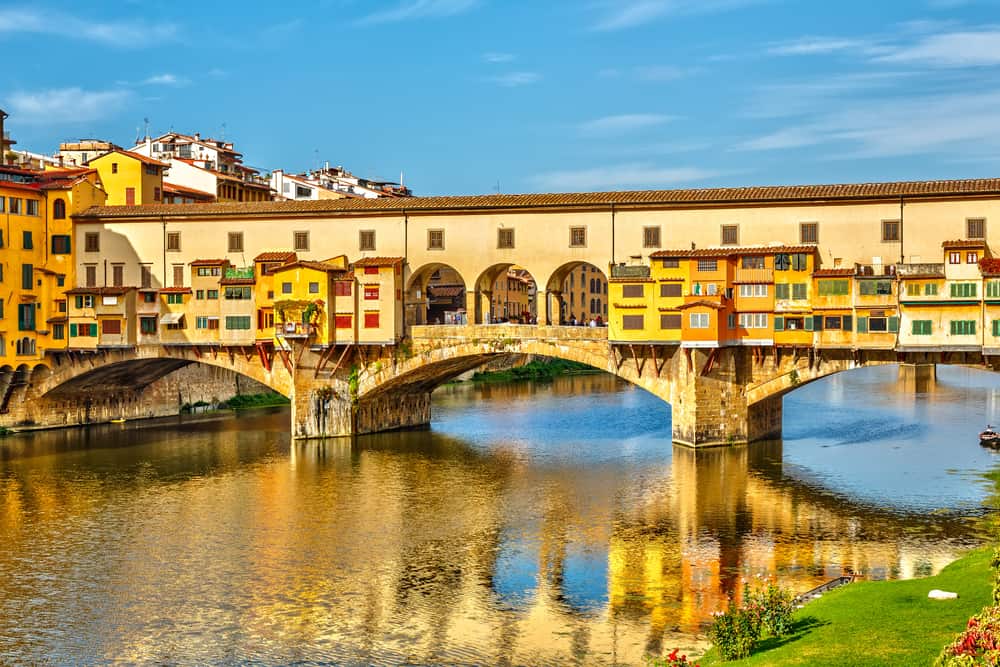 The colorful Ponte Vecchio bridge over the Arno River.