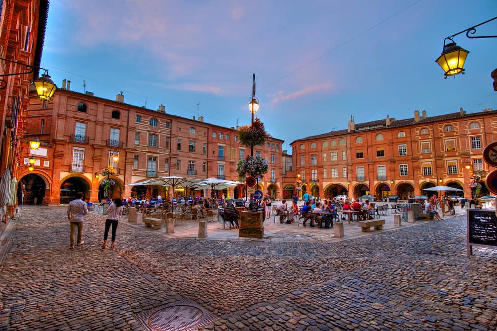 A beautiful square in Montauban, France at dusk.