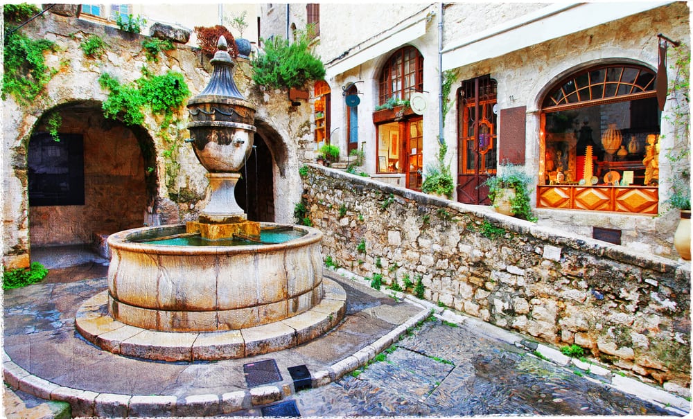 Small square in Saint-Paul de Vence, France with a fountain.