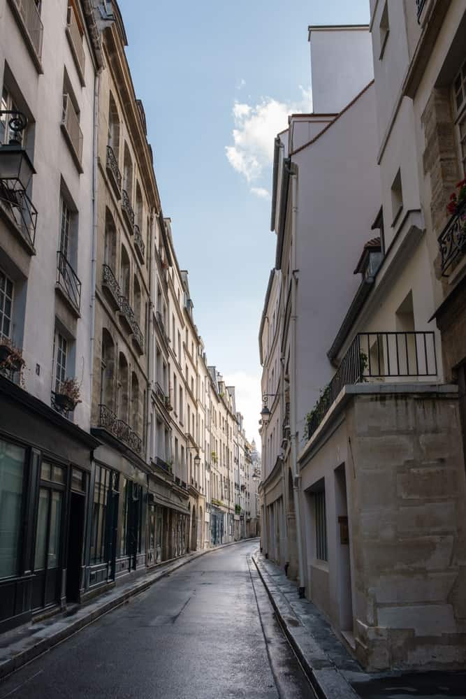 Narrow street in the district of Le Marais in Paris, France.
