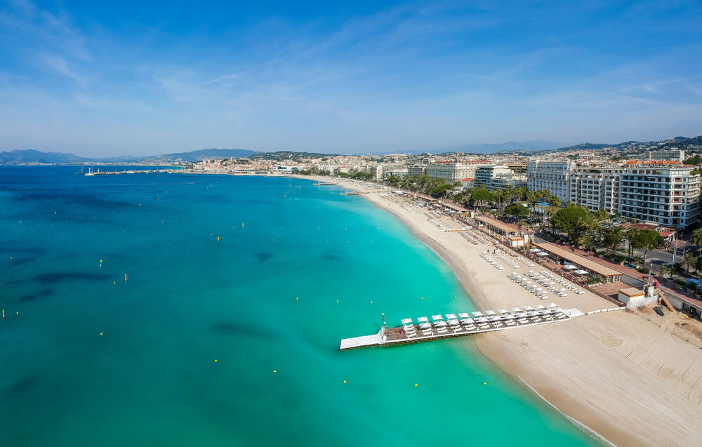 Beach in Cannes, France and the Promenade de la Croisette.