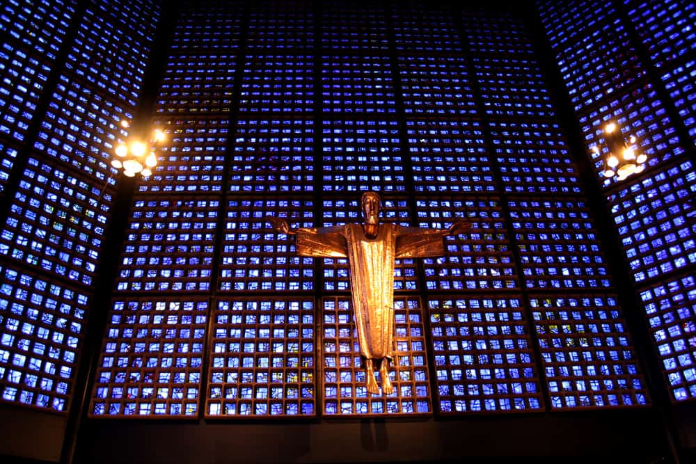 Inside view of Kaiser Wilhelm Memorial Church in Berlin. Jesus on the cross.