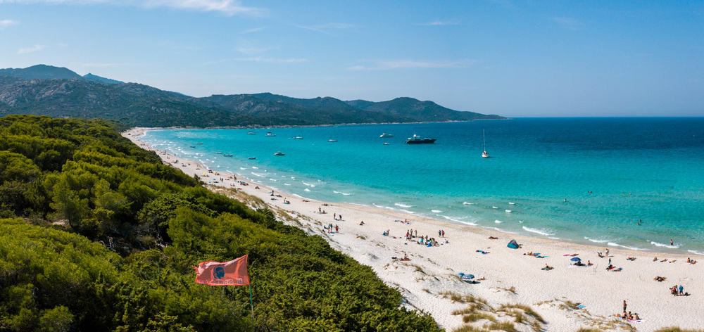 Panoramic view of Saleccia beach with turquoise waters in Cap Corse, France.