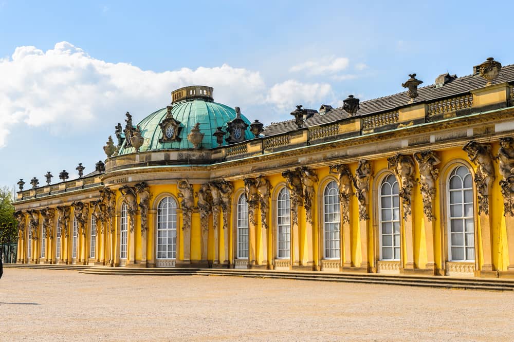 Outside view of the yellow Sanssouci Palace in Potsdam, Berlin.