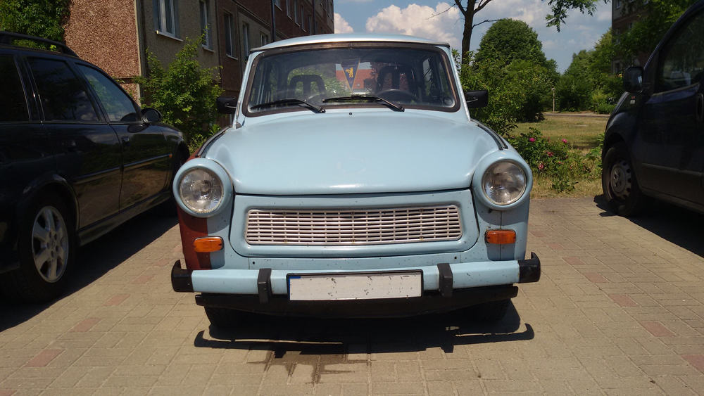 Front view of a light blue Trabant car.
