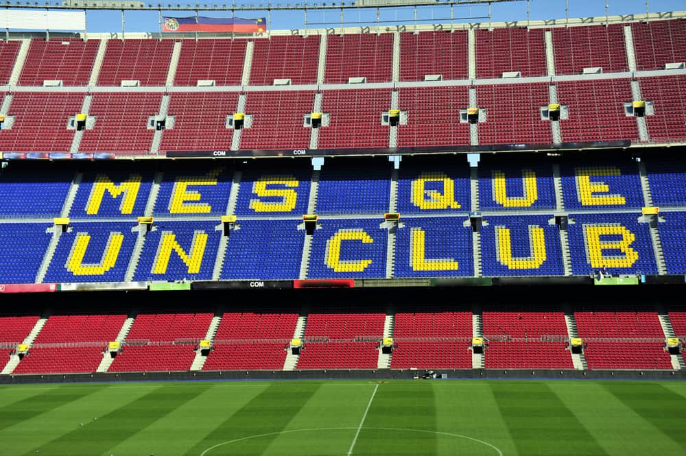 Inside the Camp Nou soccer stadium in Barcelona. The words saying "Mes que un club" - More than a club.